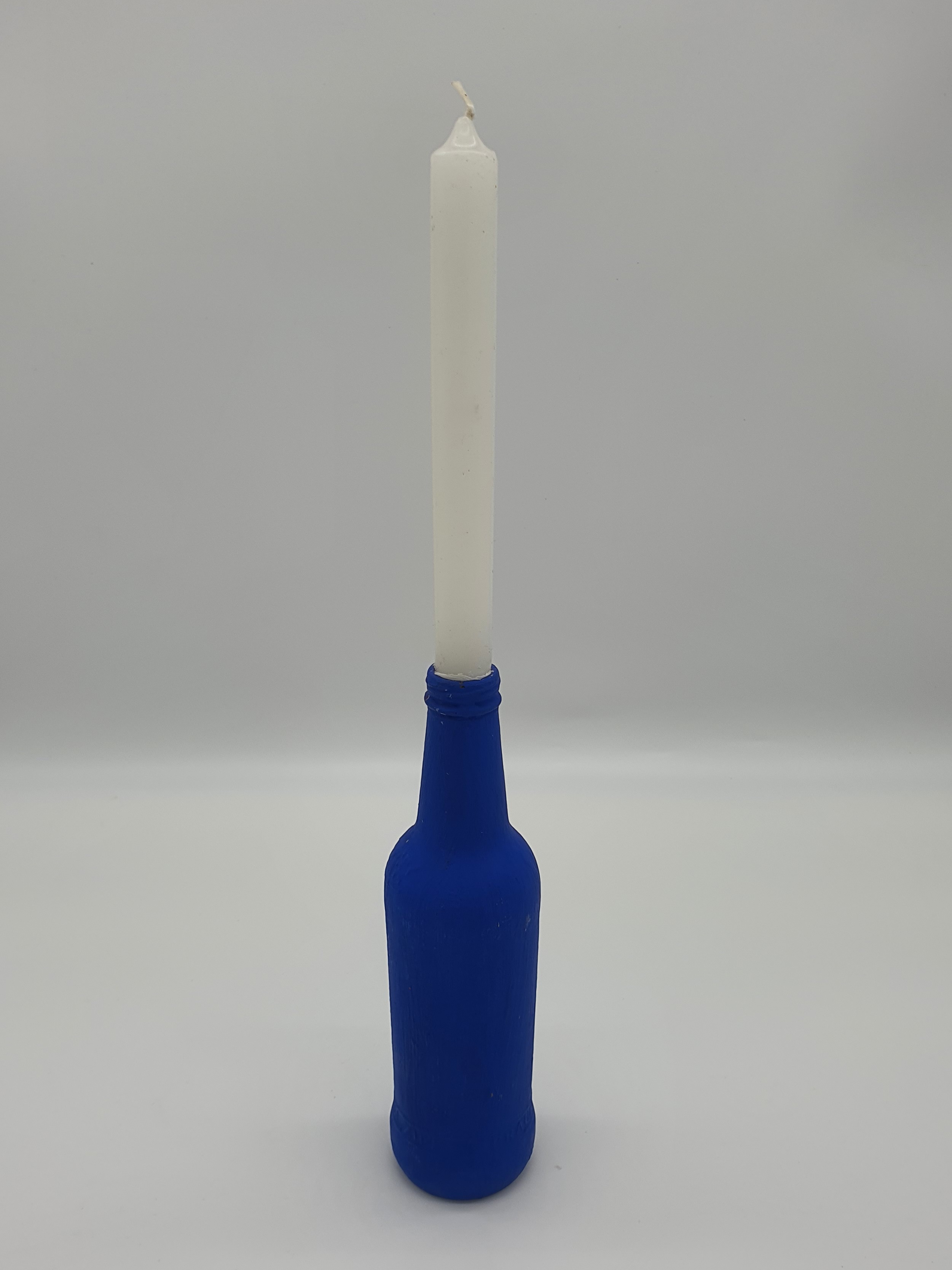 Flasche mit Kerze